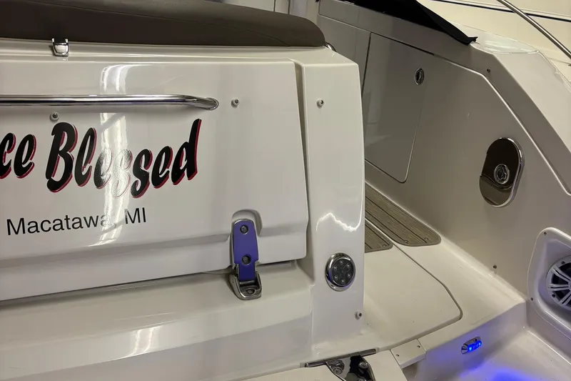 Slide: The Image of 2014 Sea Ray 370 Sundancer boat with "Bee Blessed" text, docked in Macatawa, MI. - 32