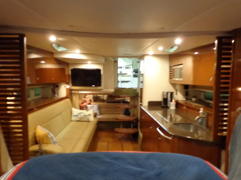 Slide: The Image of Luxurious interior of 2014 Sea Ray 370 Sundancer yacht with modern amenities. - 5