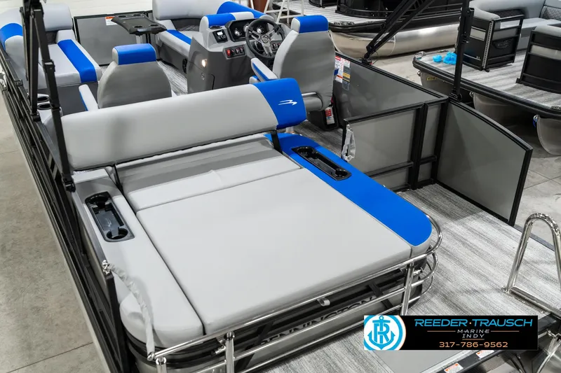 Slide: The Image of 2025 Bennington 20 SSB pontoon boat interior with gray and blue seating. - 15