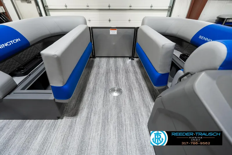 Slide: The Image of 2025 Bennington 20 SSB interior with gray and blue seating, modern design. - 23