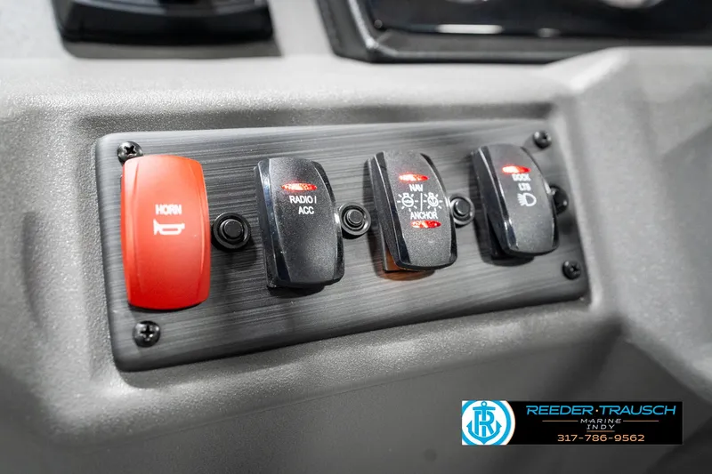 Slide: The Image of Dashboard switches on a 2025 Bennington 20 SSB boat. - 33
