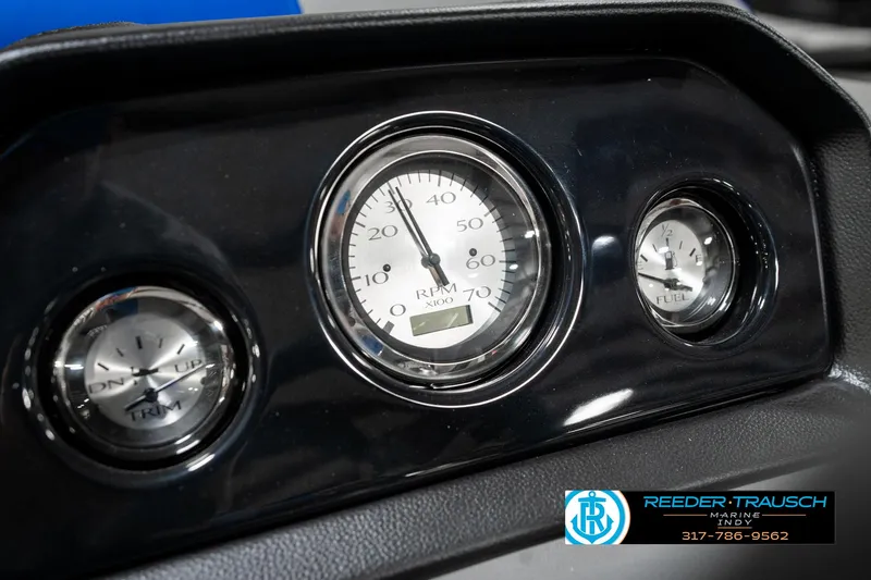Slide: The Image of Dashboard gauges of a 2025 Bennington 20 SSB boat, featuring RPM and fuel indicators. - 35