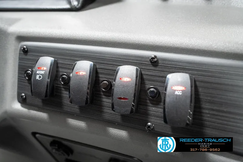 Slide: The Image of Control panel of 2025 Bennington 20 SSB boat with labeled switches. - 37