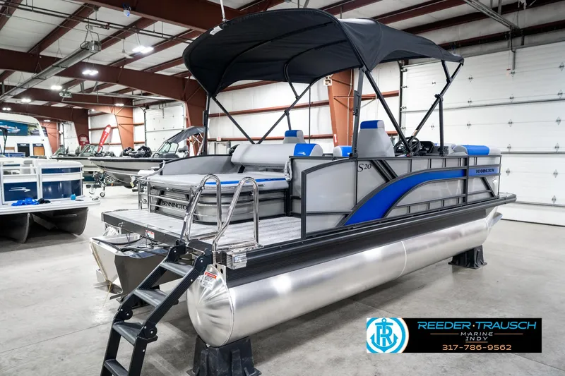 Slide: The Image of 2025 Bennington 20 SSB pontoon boat with canopy in showroom. - 8