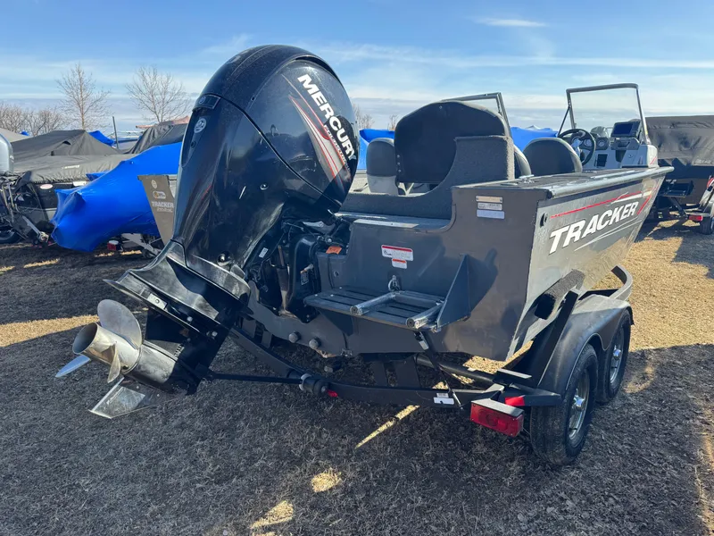 Slide: The Image of 2017 Tracker Targa V-18 Combo boat with Mercury outboard motor on a trailer. - 4