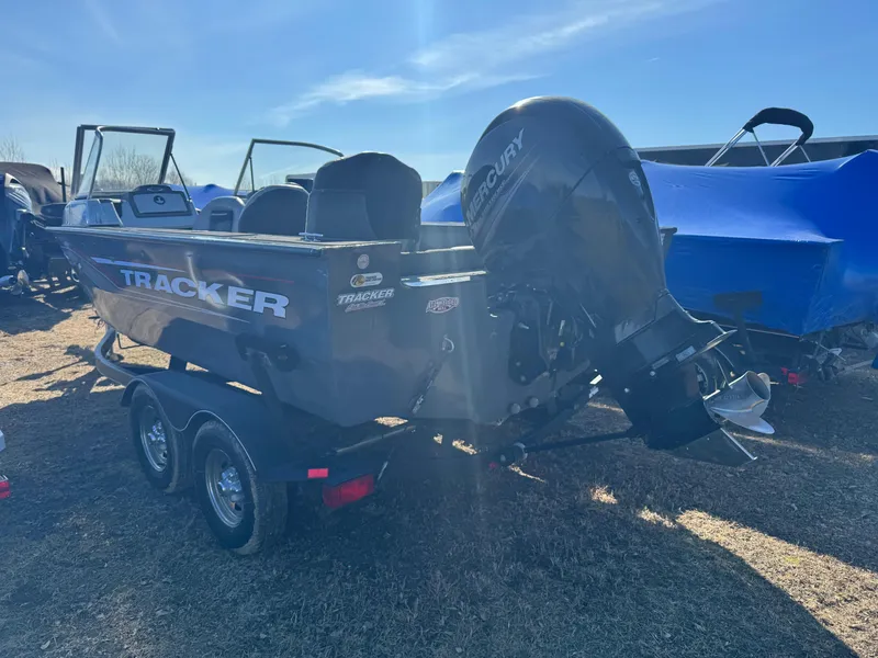 Slide: The Image of 2017 Tracker Targa V-18 Combo boat with Mercury outboard motor on a trailer. - 6