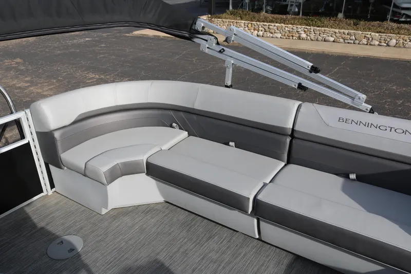 Slide: The Image of 2021 Bennington SX 20 Quad Bench interior with gray seating and sleek design. - 17