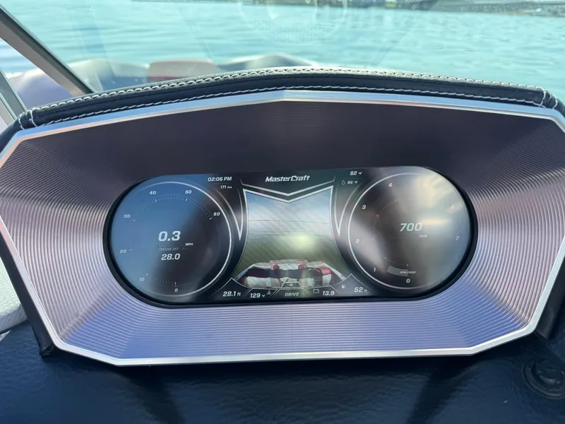 Slide: The Image of Dashboard of a 2019 MasterCraft X46 boat, displaying speed and engine data. - 19