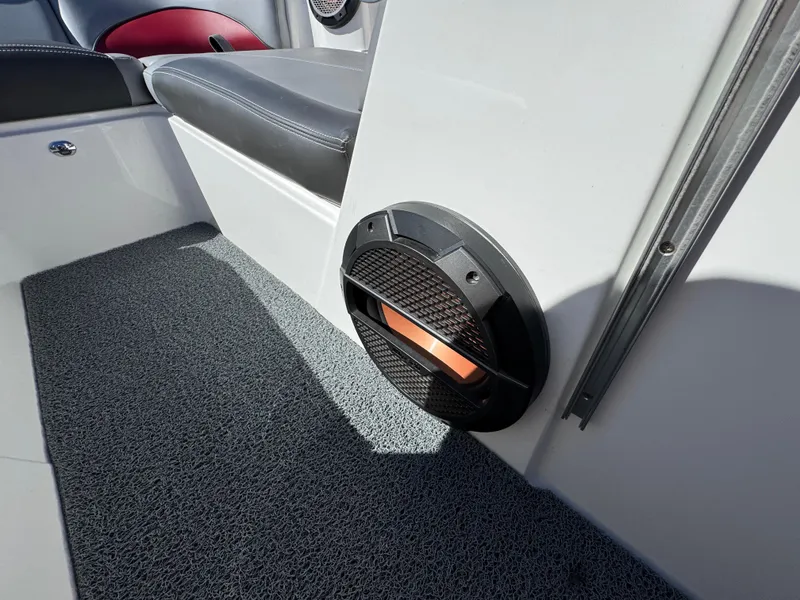 Slide: The Image of 2019 MasterCraft X46 interior with speaker and seating detail. - 23