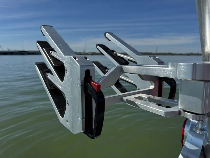 Slide: The Image of 2019 MasterCraft X46 wakeboard rack on a calm lake background. - 41