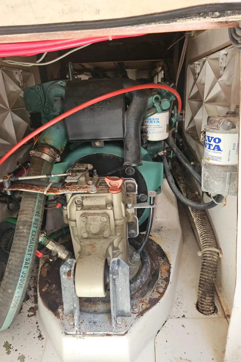 Slide: The Image of Engine compartment of 2014 C&C Mega 30 One Design sailboat, featuring Volvo Penta components. - 12