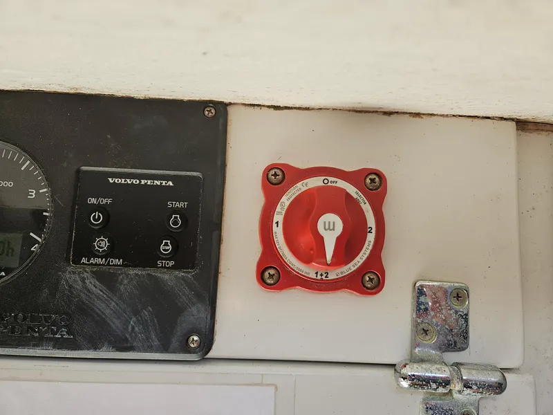 Slide: The Image of Control panel of a 2014 C&C Mega 30 One Design boat with battery switch. - 13