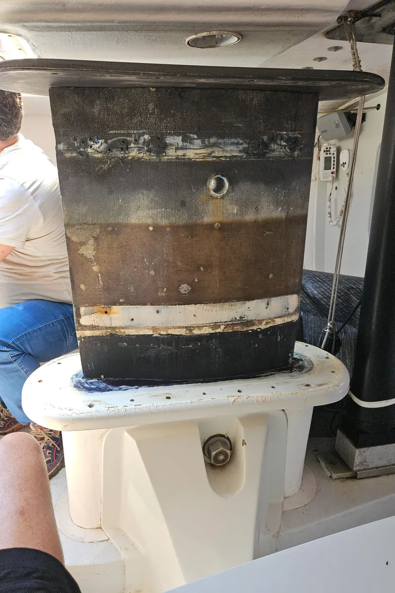 Slide: The Image of C&C Mega 30 One Design sailboat interior, 2014 model, featuring a central column structure. - 19