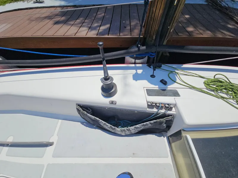 Slide: The Image of C&C Mega 30 One Design sailboat deck, 2014 model, featuring winch and control panel. - 8