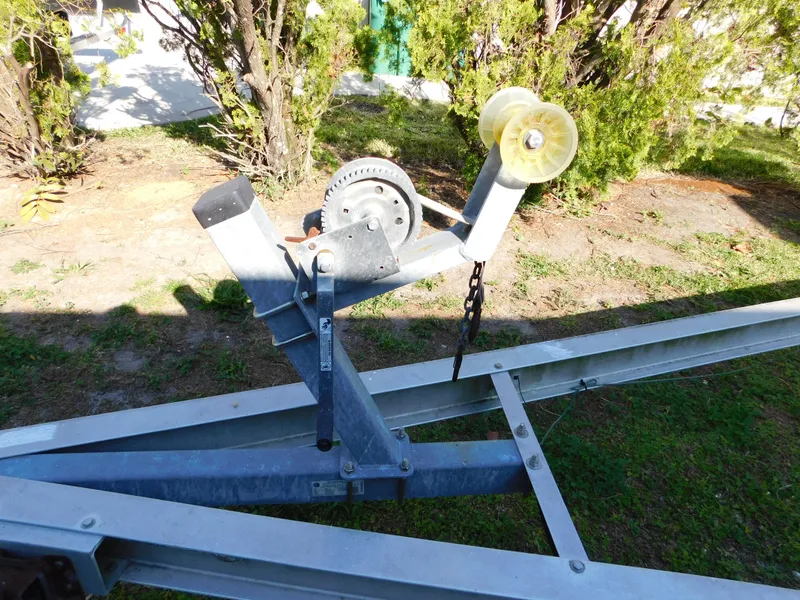 Slide: The Image of Trailer winch for 2014 Century 2001 Bay CC boat, parked on grass. - 16
