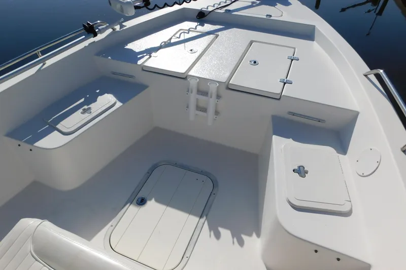 Slide: The Image of Interior view of a 2014 Century 2001 Bay CC boat, featuring storage compartments. - 7