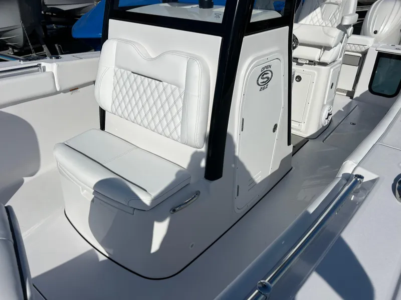 Slide: The Image of 2025 Sportsman Open 262 Center Console with white seating and sleek design. - 15