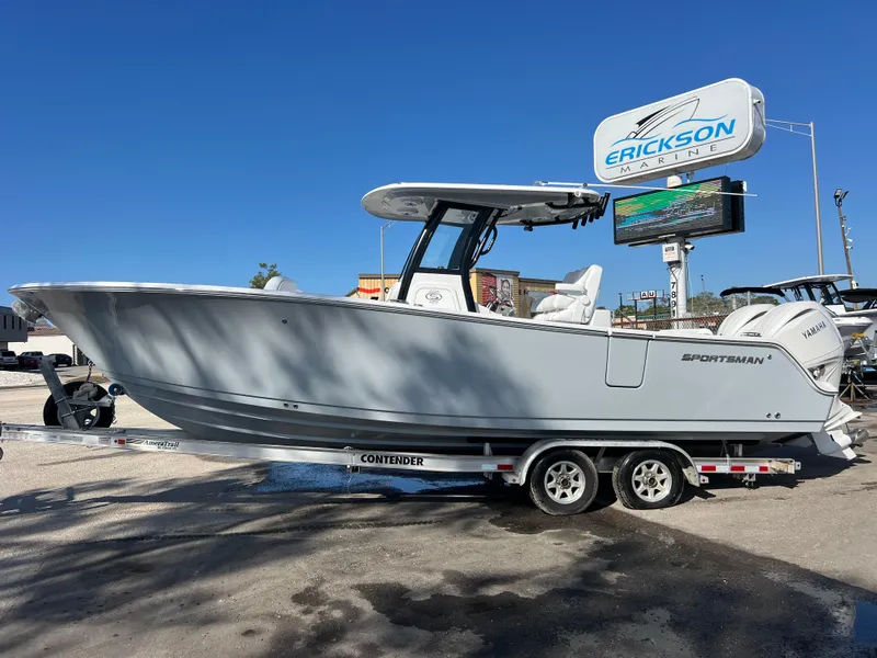 Slide: The Image of 2025 Sportsman Open 262 Center Console boat on trailer at dealership. - 2
