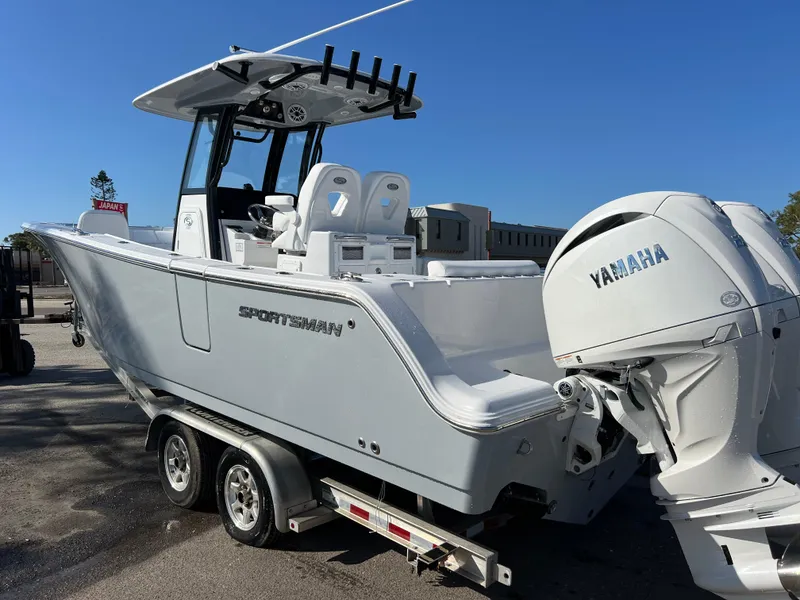 Slide: The Image of 2025 Sportsman Open 262 Center Console boat with Yamaha engine on trailer. - 4