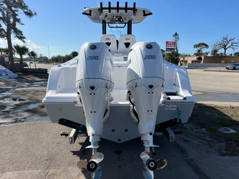 Slide: The Image of 2025 Sportsman Open 262 Center Console with dual 200 horsepower engines, rear view. - 5