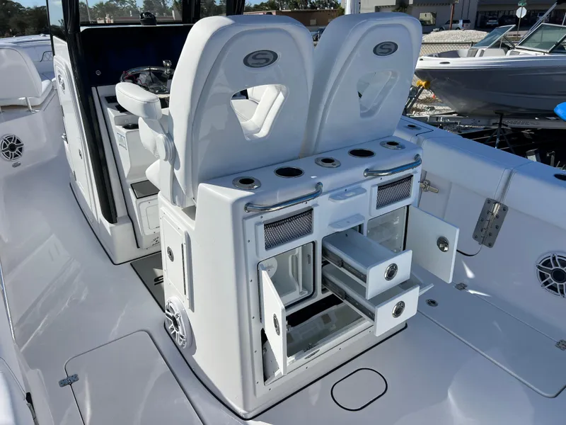 Slide: The Image of 2025 Sportsman Open 262 Center Console with storage drawers and seating. - 8