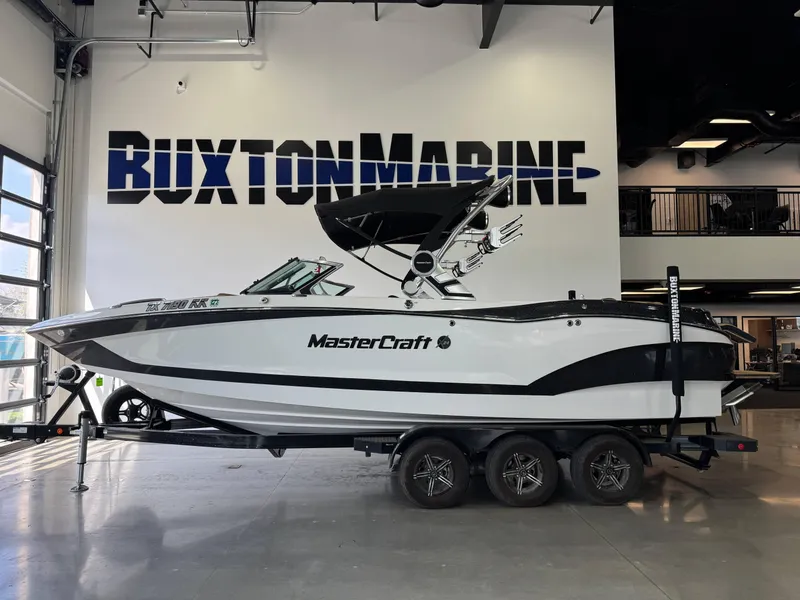 Slide: The Image of 2021 MasterCraft X24 boat displayed at Buxton Marine showroom. - 3