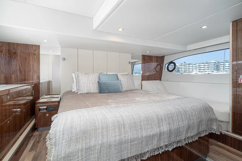 Slide: The Image of Luxurious interior of 2024 Riviera 4600 Sport Yacht with elegant bedroom design. - 43