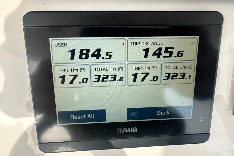 Slide: The Image of Yamaha display showing fuel usage, trip distance, and engine hours for 2024 Regulator 31 boat. - 22
