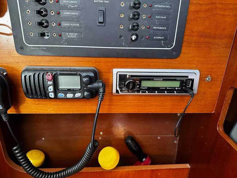 Slide: The Image of Control panel and radio equipment on a 2006 Beneteau First 36.7 sailboat. - 17