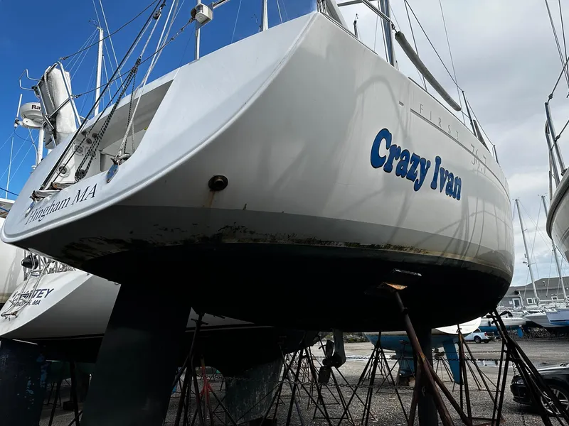 Slide: The Image of 2006 Beneteau First 36.7 sailboat "Crazy Ivan" on stands, viewed from the stern. - 21