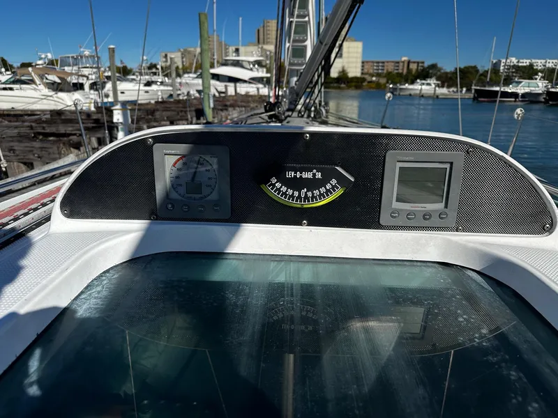 Slide: The Image of Control panel of a 2006 Beneteau First 36.7 sailboat at a marina. - 23