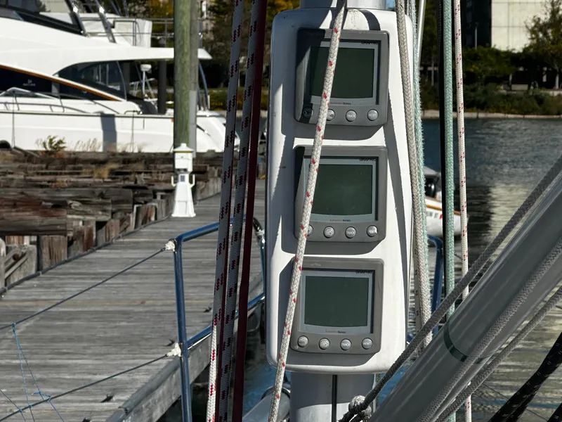 Slide: The Image of Sailing instruments on a 2006 Beneteau First 36.7 yacht docked at a marina. - 24