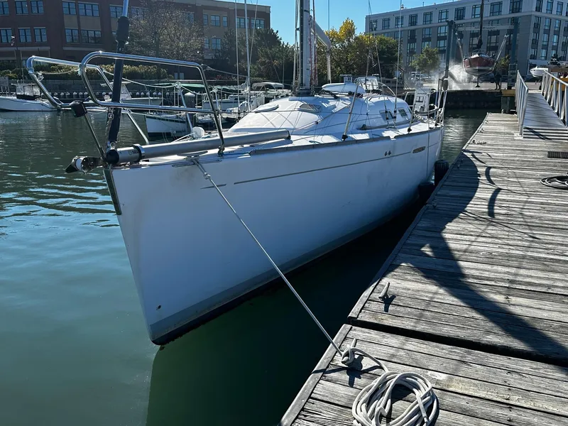 Slide: The Image of 2006 Beneteau First 36.7 sailboat docked at a marina, sunny day. - 3