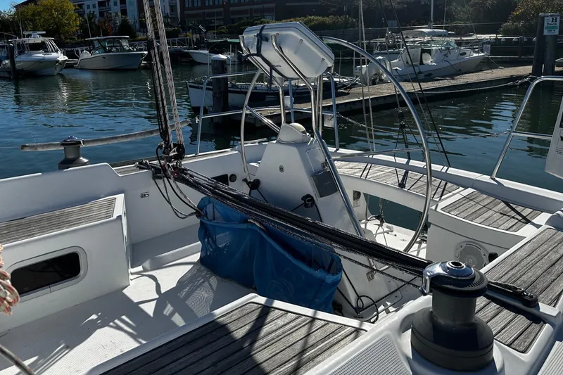 Slide: The Image of Sailboat cockpit of 2006 Beneteau First 36.7, docked in a marina. - 30