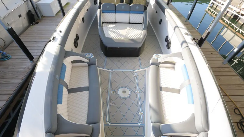 Slide: The Image of 2017 Mystic Powerboats M4200 interior with spacious seating and elegant design. - 18