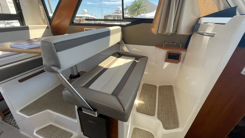 Slide: The Image of 2023 Cutwater C-288 interior with modern seating and sleek design elements. - 23