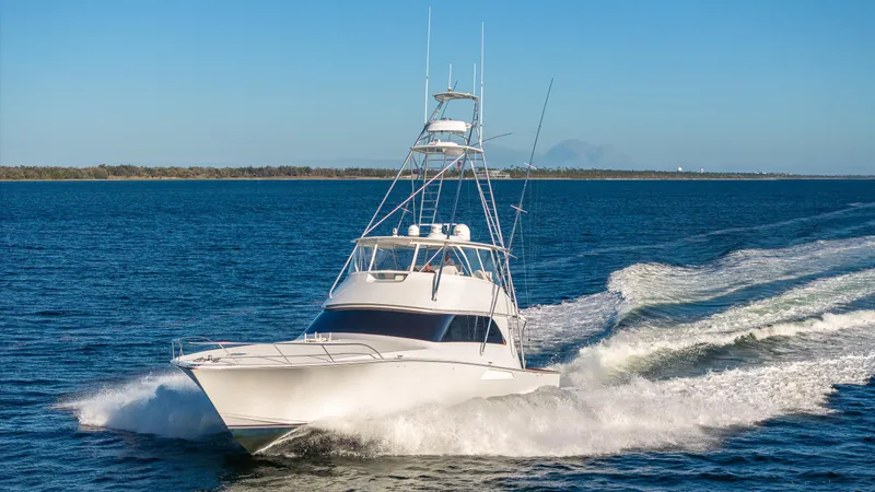 Slide: The Image of Viking 2005 yacht cruising on open water, 2004 model, creating a dynamic wake. - 12