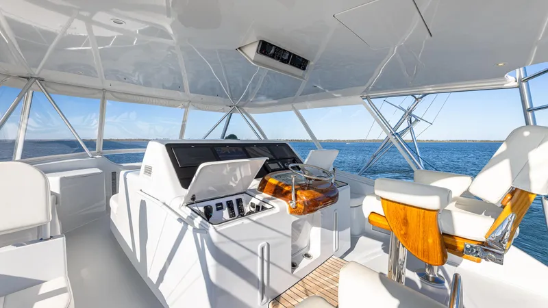 Slide: The Image of Luxurious 2004 Viking yacht interior with modern helm and ocean view. - 15