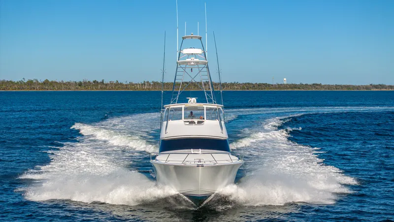 Slide: The Image of Viking 2005 yacht cruising on open water, creating a dynamic wake. - 2