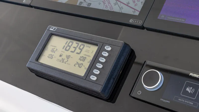 Slide: The Image of Digital display on a Viking 2005 boat dashboard, showing navigation and system information. - 20