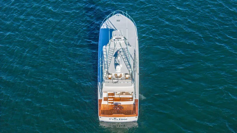 Slide: The Image of Aerial view of 2004 Viking 2005 yacht cruising on open water. - 26