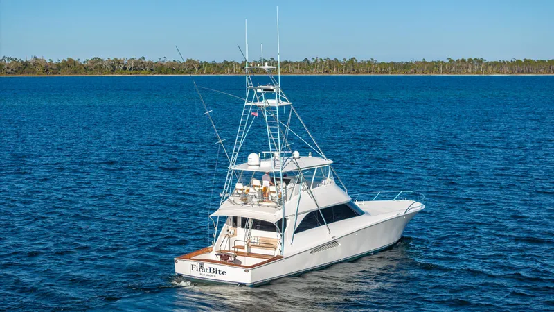 Slide: The Image of Viking 2005 yacht on blue water, 2004 model, named "Fish Bite." - 40