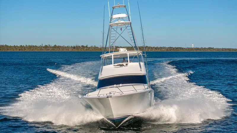 Slide: The Image of Viking 2005 yacht cruising on open water, creating a dynamic wake. - 45