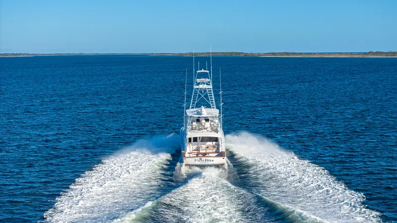 Slide: The Image of Viking 2005 yacht cruising on open water, leaving a wake behind. - 46