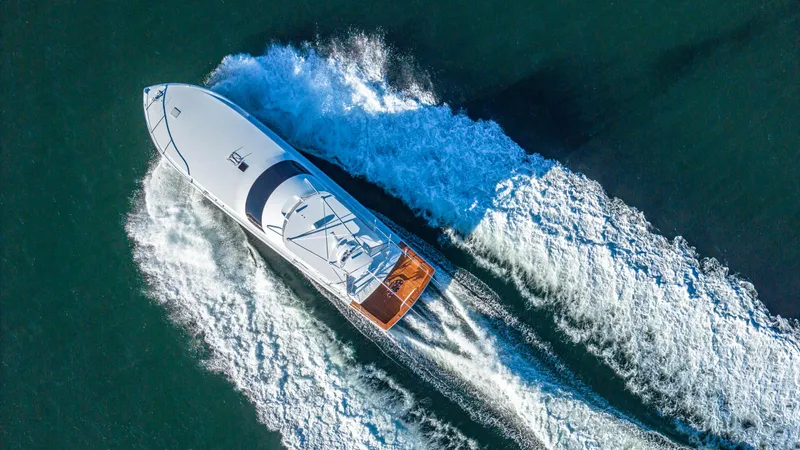 Slide: The Image of Aerial view of a 2004 Viking 2005 yacht cruising on open water. - 6