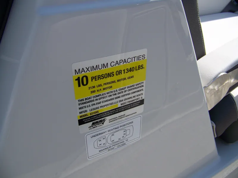 Slide: The Image of Capacity label on 2026 Crownline Eclipse E210 XS boat, seating 10 people or 1340 lbs. - 11