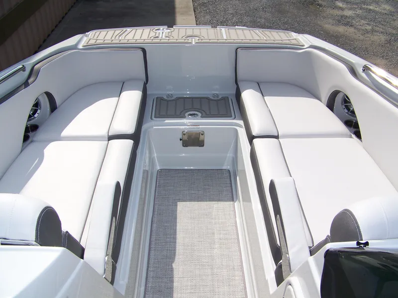 Slide: The Image of 2026 Crownline Eclipse E230 XS boat interior with spacious seating and modern design. - 12