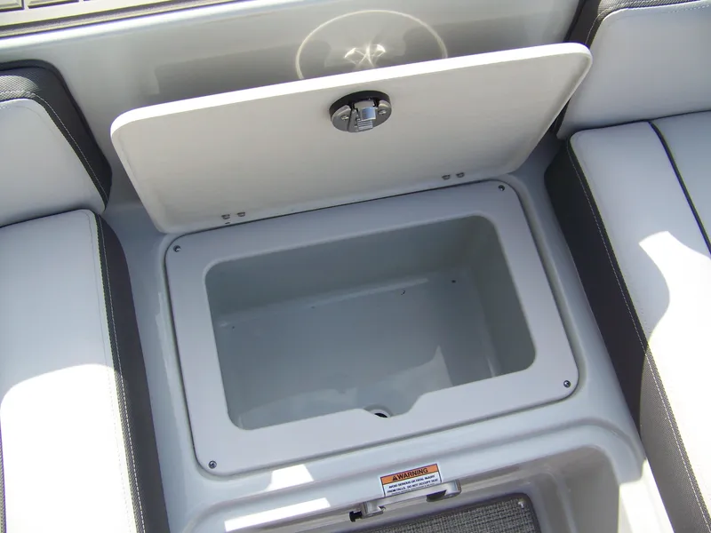 Slide: The Image of Storage compartment in 2026 Crownline Eclipse E230 XS boat interior. - 13