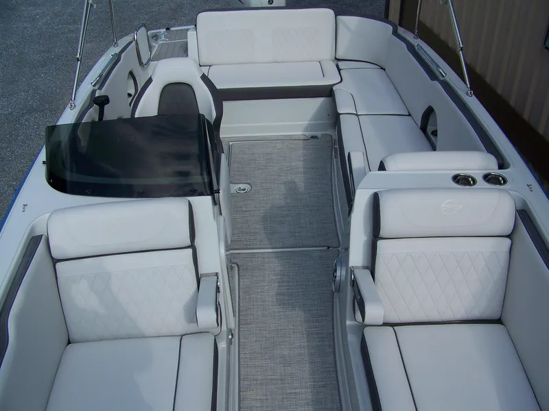 Slide: The Image of 2026 Crownline Eclipse E230 XS boat interior with white seating and modern design. - 15