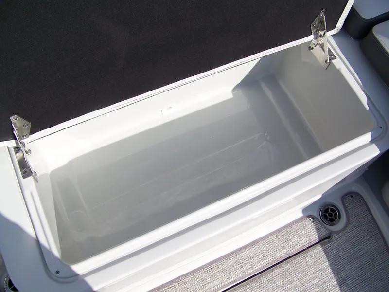 Slide: The Image of Open storage compartment in 2026 Crownline Eclipse E230 XS boat. - 7